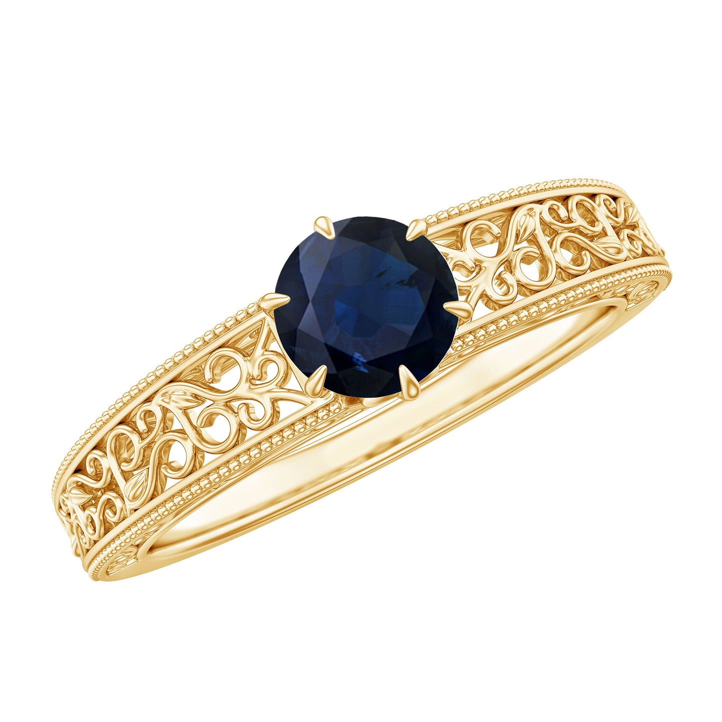 A yellow gold ring with an ornate filigree band and a round-cut dark blue sapphire center stone, shown on a plain white background.