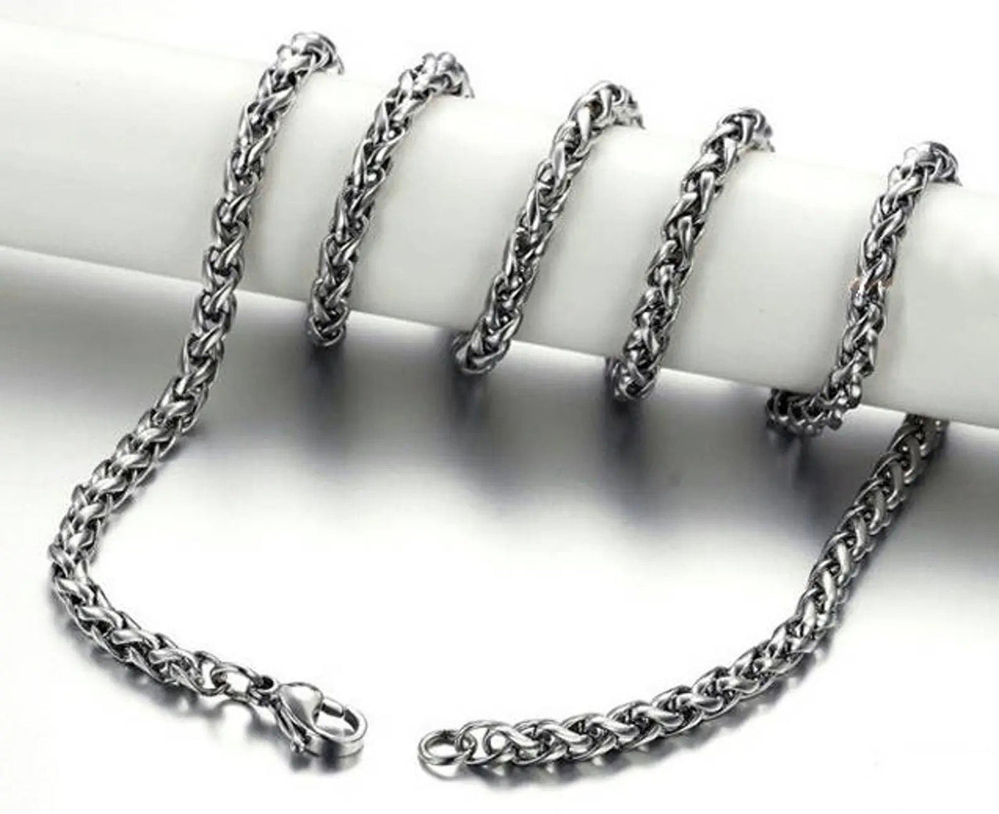 Silver chain necklace on a white background