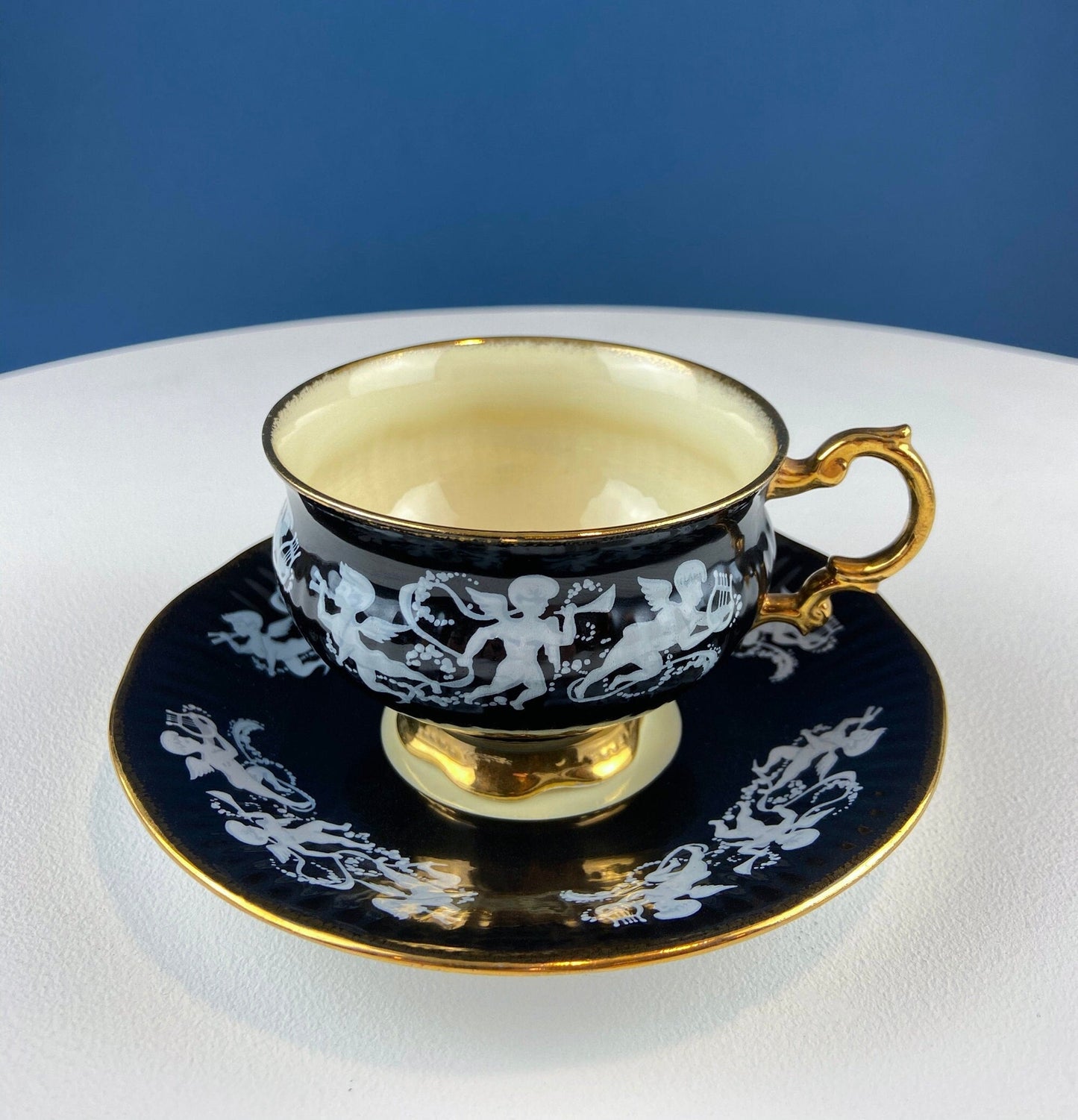 Vintage Elizabethan Fine Bone China Cup and Saucer: Handpainted Cupids