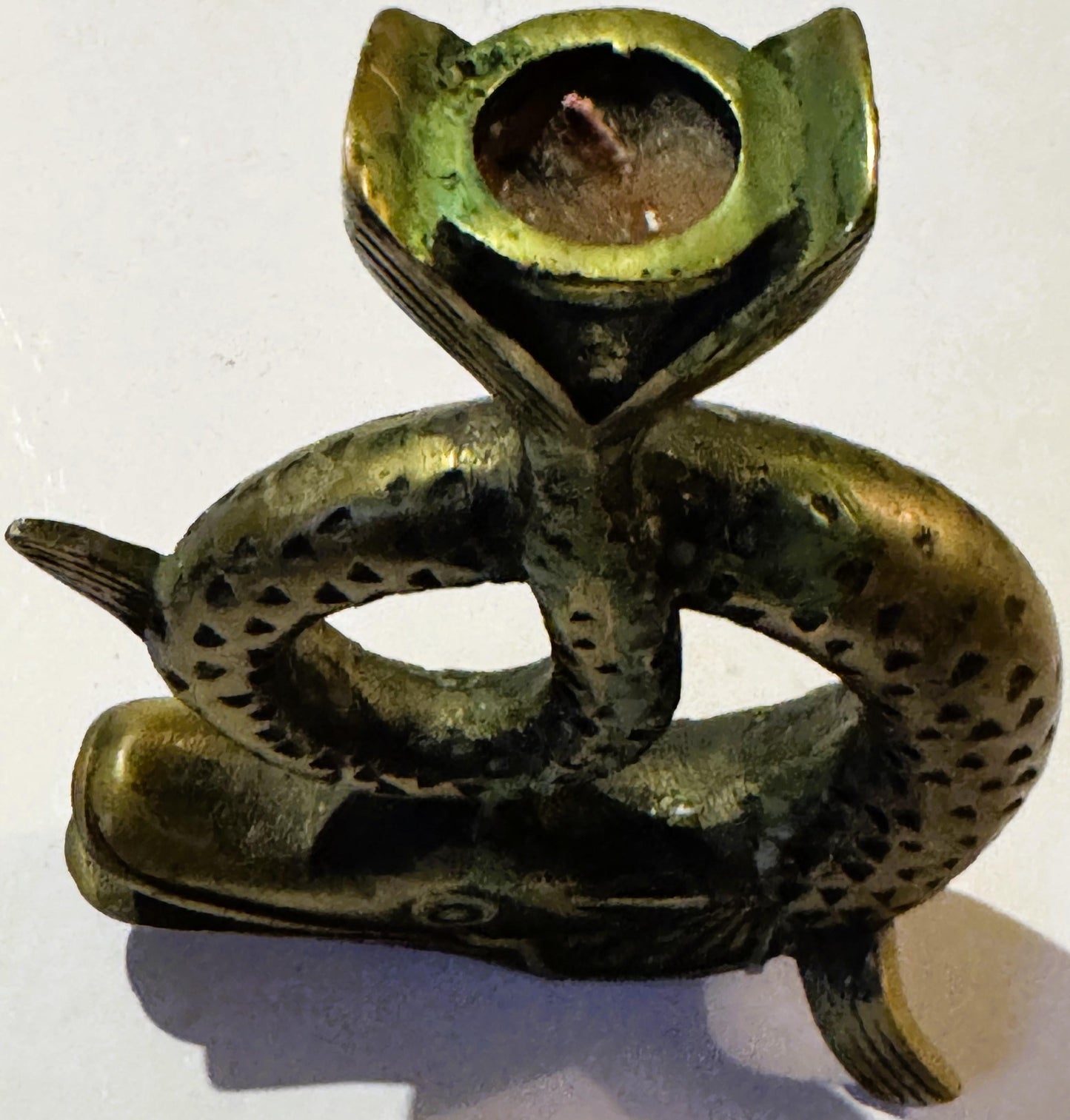The Aged Bronze Pike Candlestick