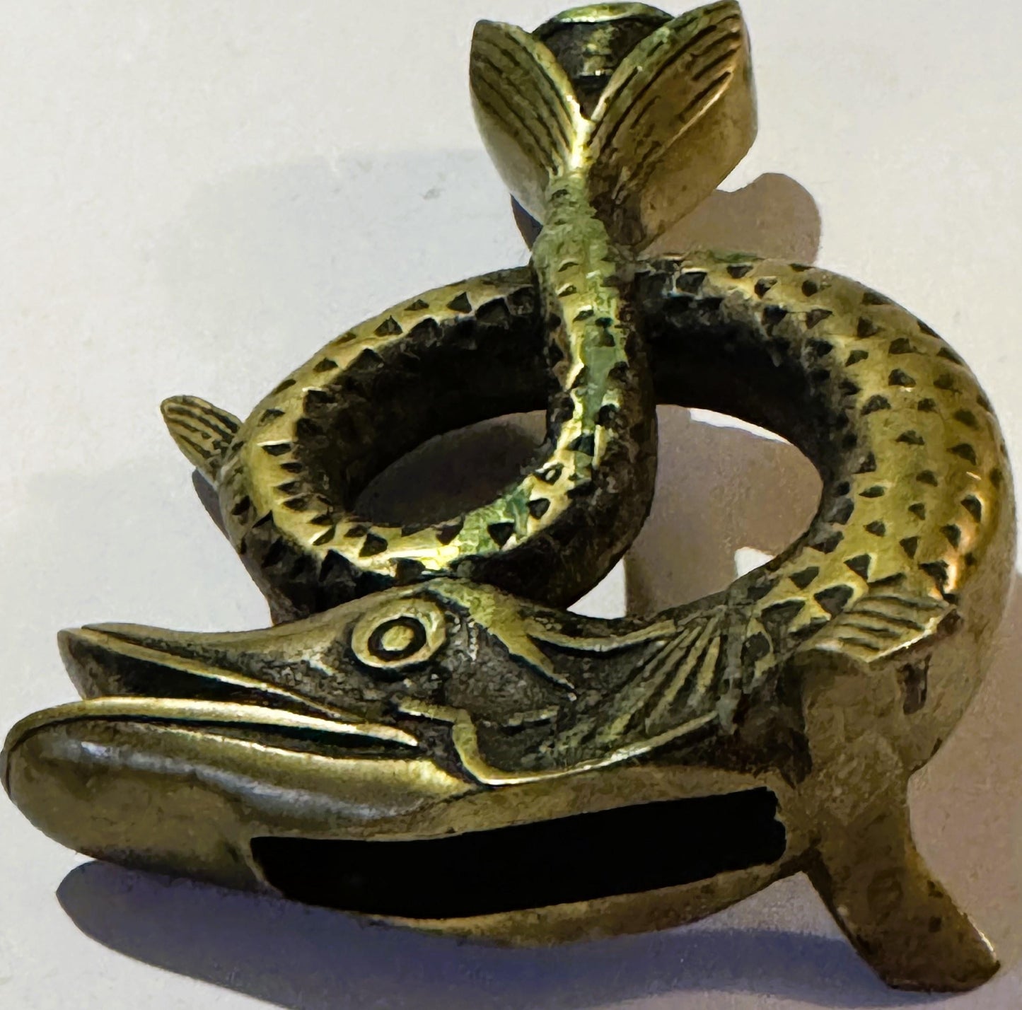 The Aged Bronze Pike Candlestick