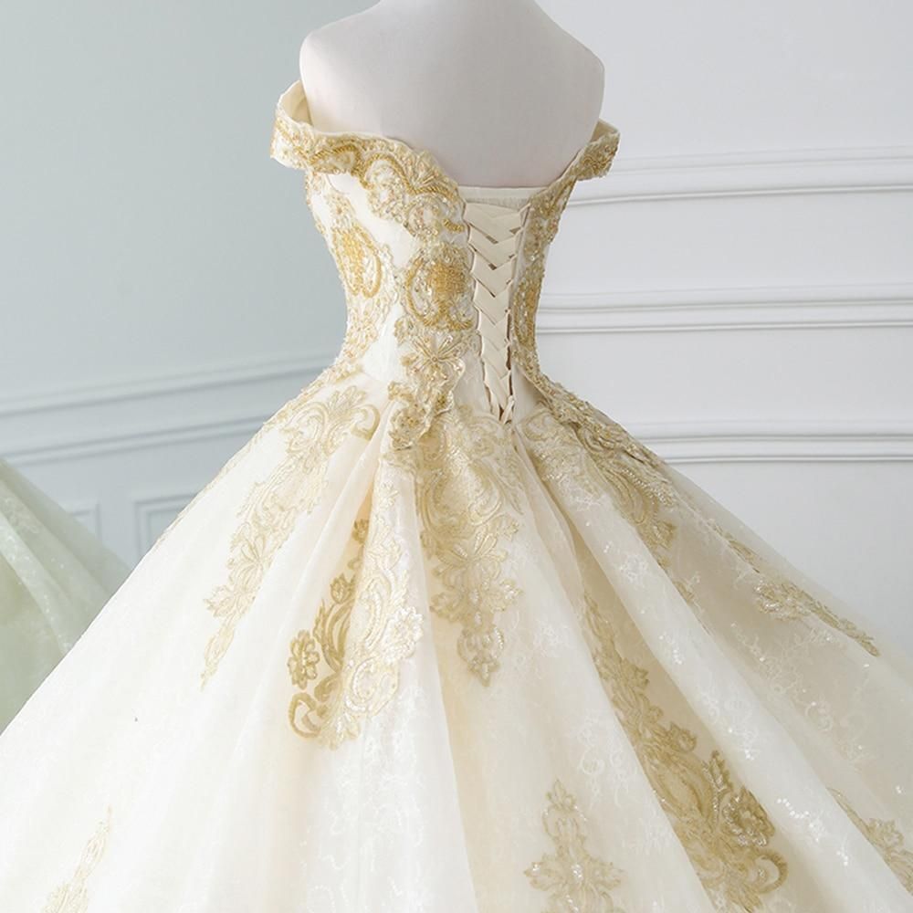 The Immaculate Cathedral Gown | Gold Lace Ball Gown Wedding Dress